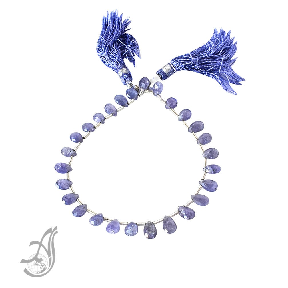 Tanzanite Flat Briolette Faceted 6.2x4.5mm 8 inch strand, inch ,Beautiful light blue. Creative. Looks like Ceylone Saphire.