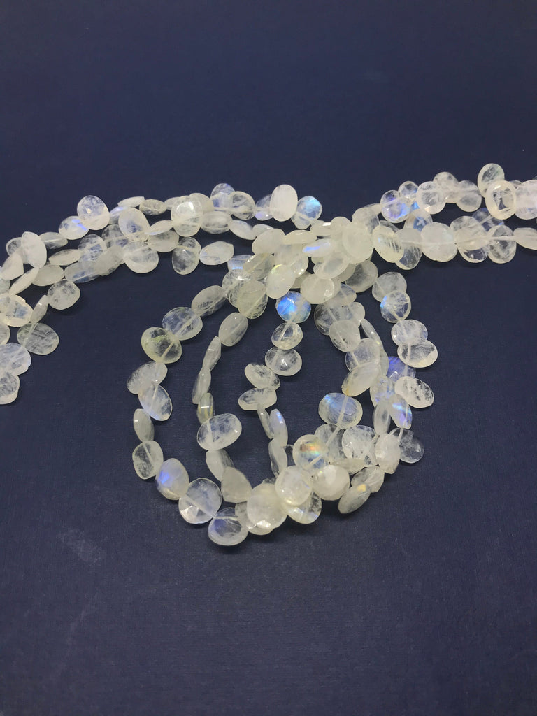 AAA Rainbow Moonstone Oval Facetted side, 9x7 appx. drill, beautifull rainbow/ shine (# 1074)