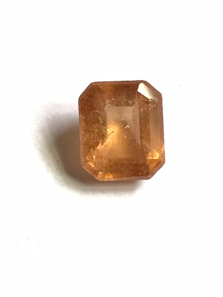 Natural Fire Opal  Rectangularcut,8.5x10 mm One of a kind,  very creative.