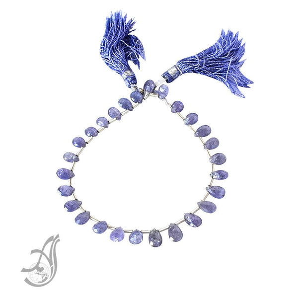 Tanzanite Flat Briolette Faceted 6.2x4.5mm 8 inch strand, inch ,Beautiful light blue. Creative. Looks like Ceylone Saphire.