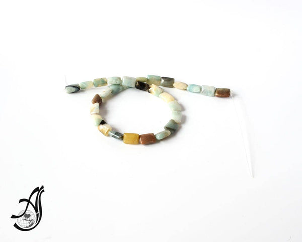 Peruvian Agate Octagon 10x14 mm 16 inch. Multi color, very creative.