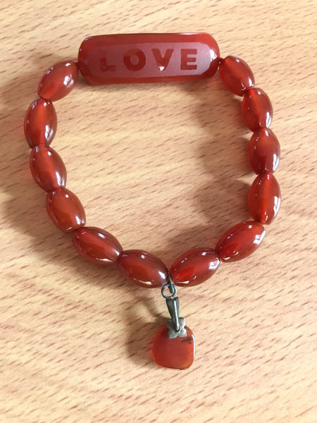 Natural Carnalion Oval Bracelet. Beautiful orange color, with hanging Charm