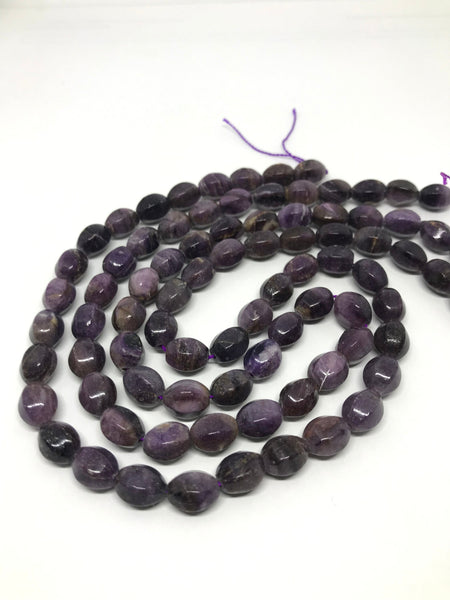 Natural Sugilite Oval/ barel Faceted 7x9 mm, with self Natural Patterns,16inch strand,Purple, best Color,Most creative,100% Natural(#959 )