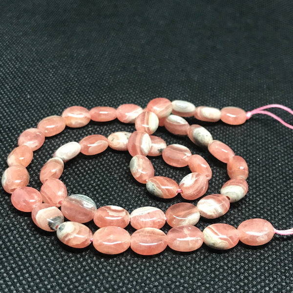 Rhodochrosite Oval 7x9 appx Plain , Top quality,100% Natural ,The best Color,Most creative patterns on it, GEM Quality.