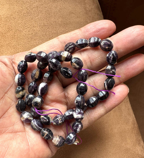 Natural Sugilite Oval/ barel Faceted 7x9 mm, with white Natural Patterns,16inch strand,Purple, best Color,Most creative,100% Natural(#920)
