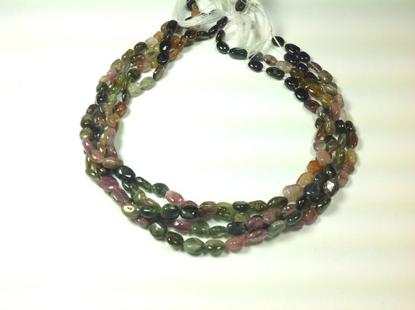 Turmaline Multicolor Oval 6x8 mm Approximate, decent quality 14 inch full strand.One of a kind,100% natural, Earth mined