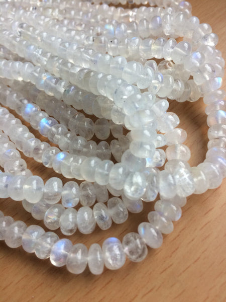Rainbow Moonstone AAA Top Quality Rondale 5 to 7 mm, Graduated, 18 inches Ful lstrand strong rainbow fire on each bead 100% Natural (#857)