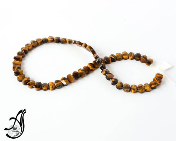 Tiger Eye Oval Faceted, Double Drill 7x9 mm 16inch full strand.One of a kind, very creative style.Black & yellow Color (code -Z)