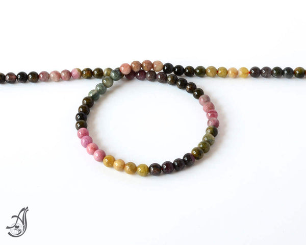 Tourmaline Round 6mm Multi color decent quality 14 inch full strand.One of a kind,100% natural Earth mined.