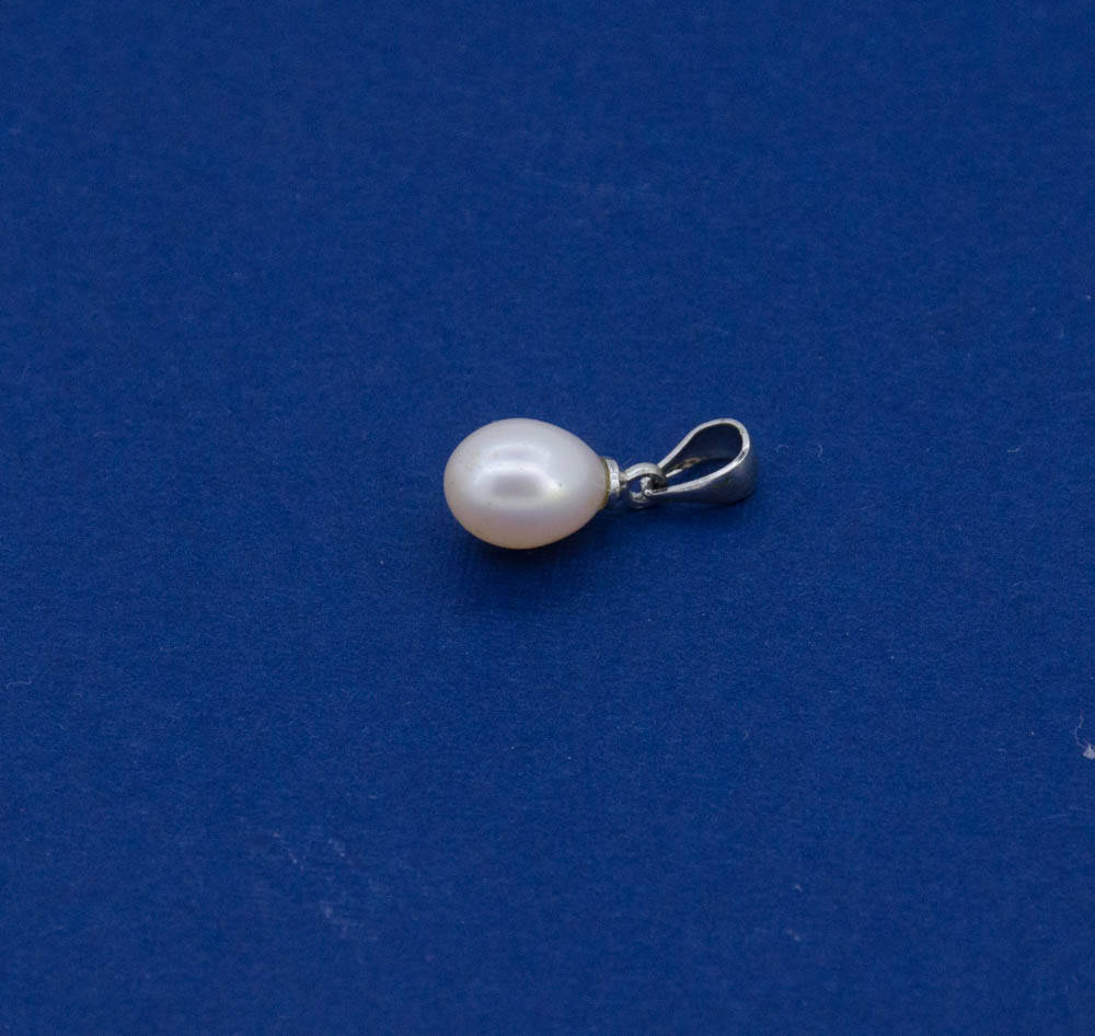 Beautiful Pendent, Freshwater Pearl 7x9 mm, white,Sterling silver bail.
