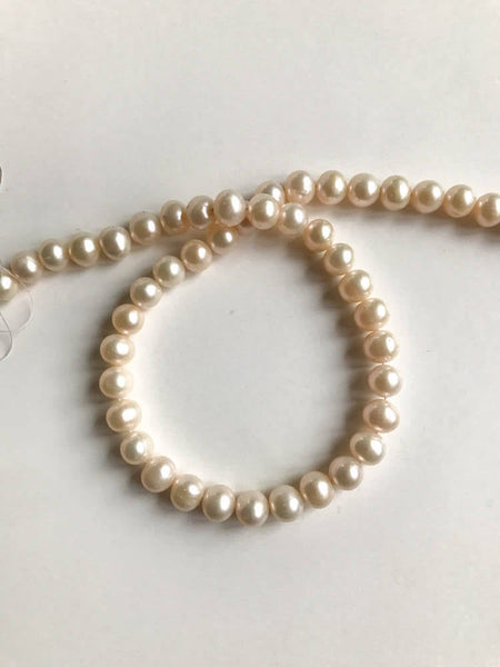 Natural Fresh water Pearl-semi Round 9 mm  16 inch, fine luster  ( S ) )