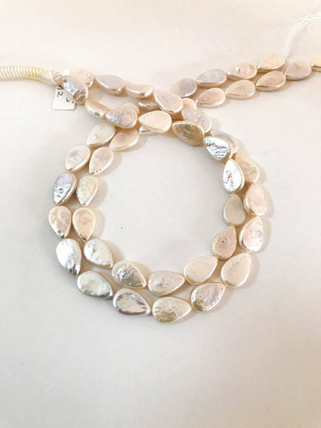 Natural Pearl pear shape / Fancy  , white 11x16 mm appx. 16 inches The AAA quality with best Luster on it  Exceent buy.( AZ)