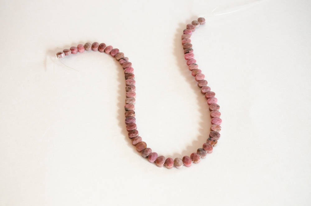 Natural Rhodonite beads Oval faceted 9x7 mm,double drilled,one of a kind