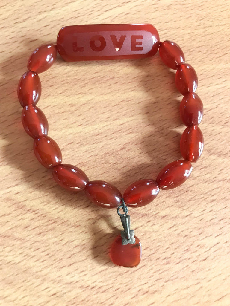 Natural Carnalion Oval Bracelet. Beautiful orange  color, with hanging Charm