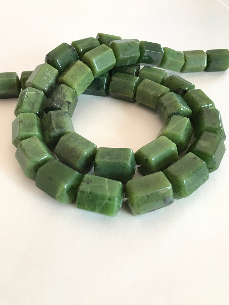 Jade Canada 15x20 mm  appx. Plain Barrel shape ,Green, very creative,one of a kind. ( #1028       )