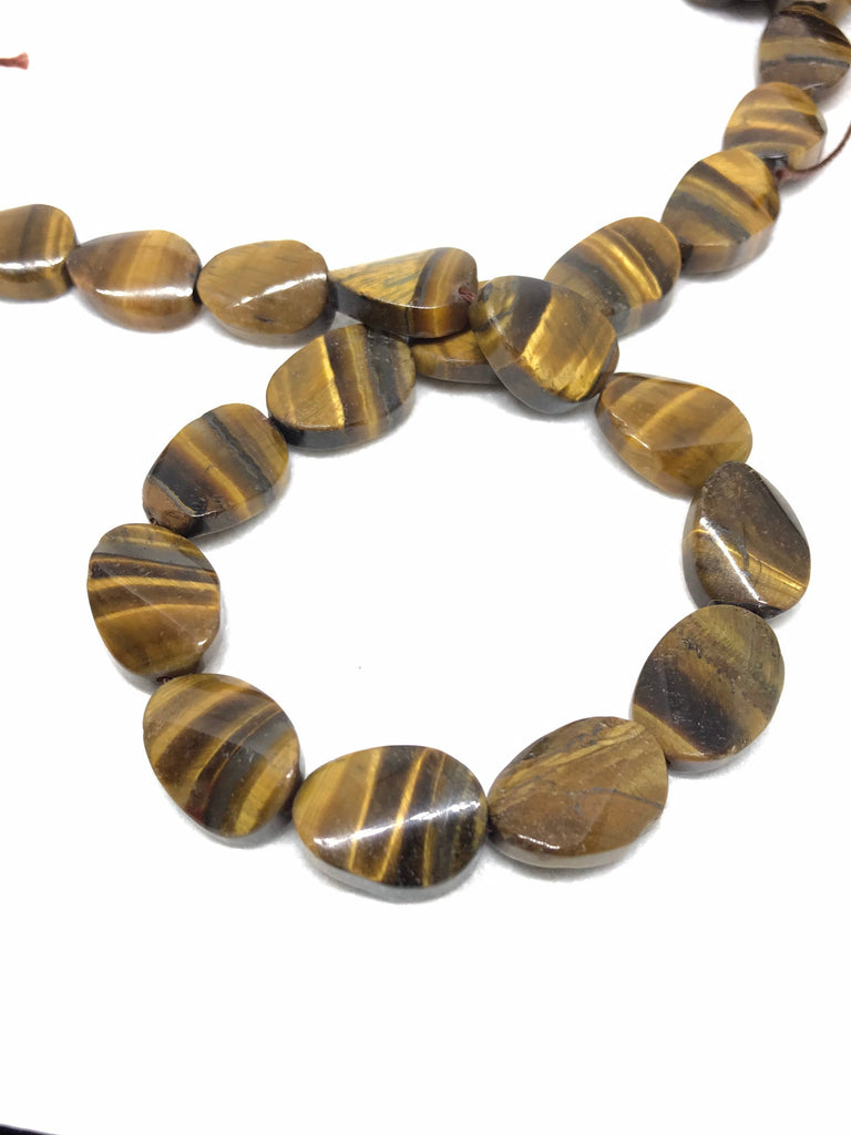 Tiger Eye Twist Oval Plain14x19 mm .16 inch.One of a kind, very creative style.Black & yellow Color (# 1168 )